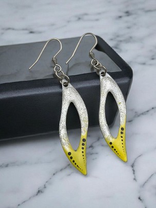 Lógós fülbevalók Sárga pöttyös